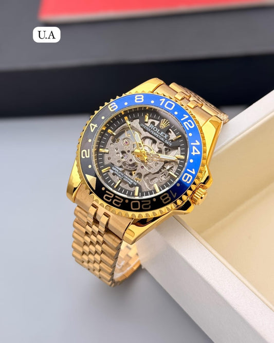 Rolex-GMT-Style Gold-Tone Skeleton Watch for Men – Black & Blue Bezel Stainless Steel Bracelet